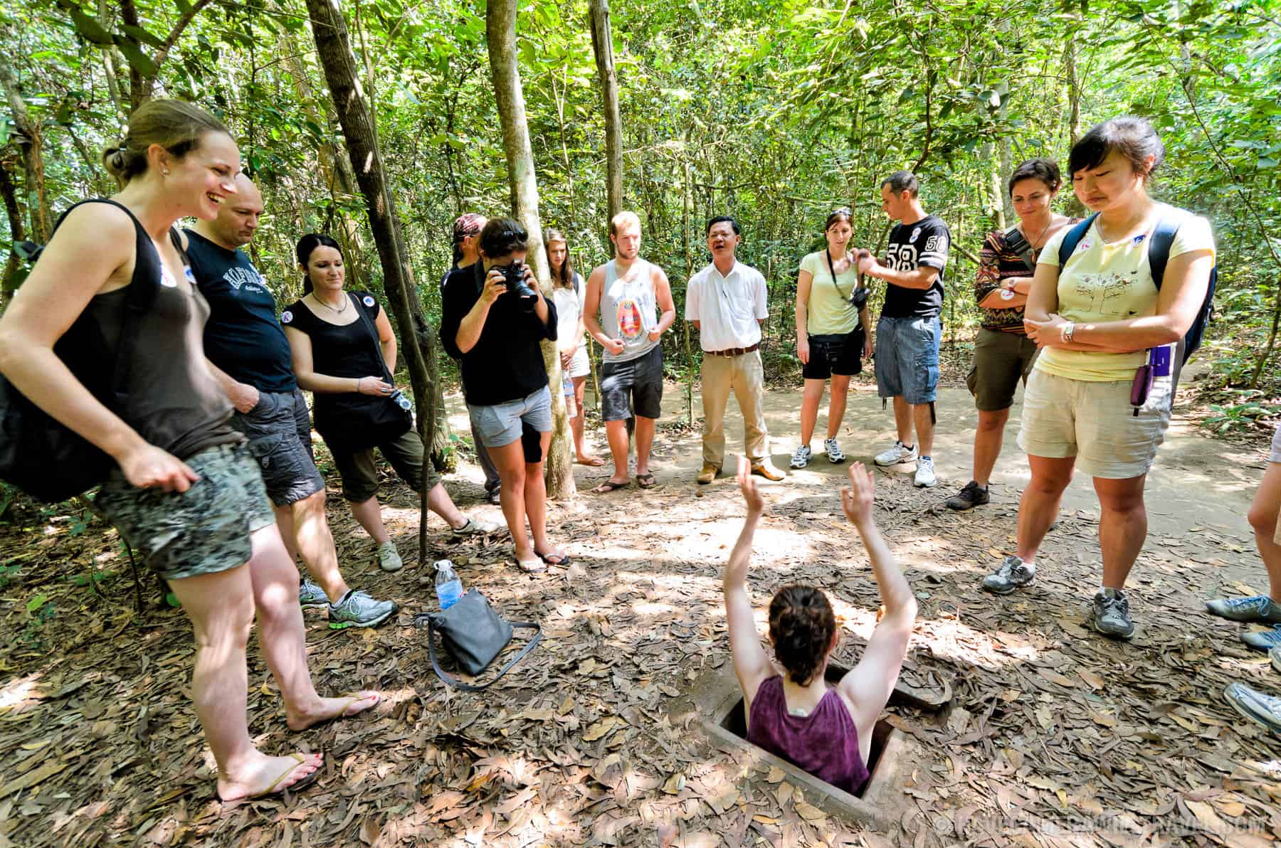 ho-chi-minh-city-photo-of-cu-chi-tunnels-tourists-in-tunnel-hole-05-copyright-havecamerawilltravel-com